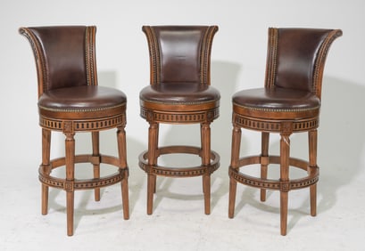 Three American Frontage Leather Swivel Bar Stools
