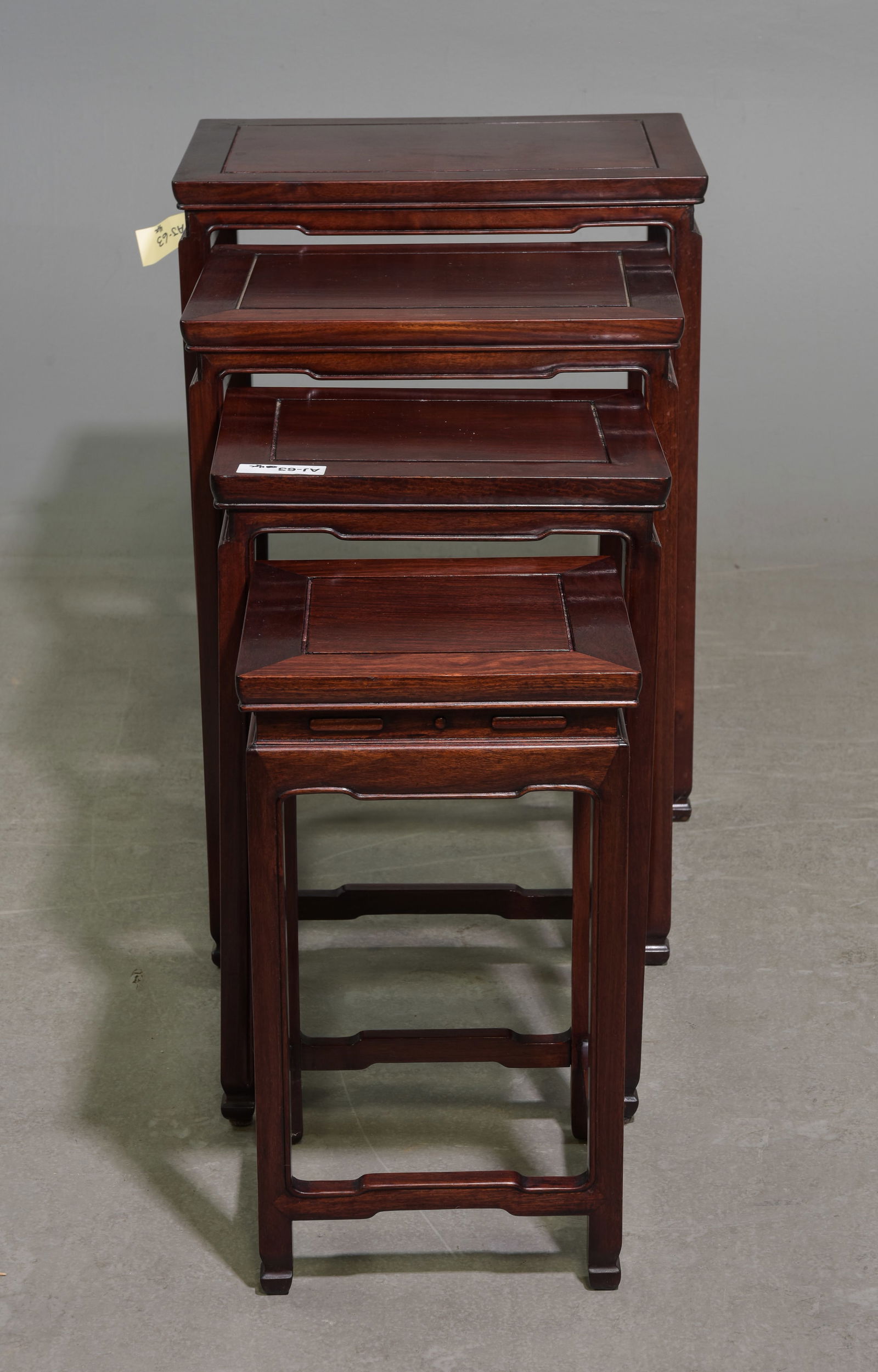 Asian Rosewood Nest of Four Tables: Asian Rosewood Nest of Four Tables - 26 in tall x 20 x 14, 24 in tall x 17 x 12.5, 22 in tall x 14 x 11.5 and 19.5 in tall x 11 x 10