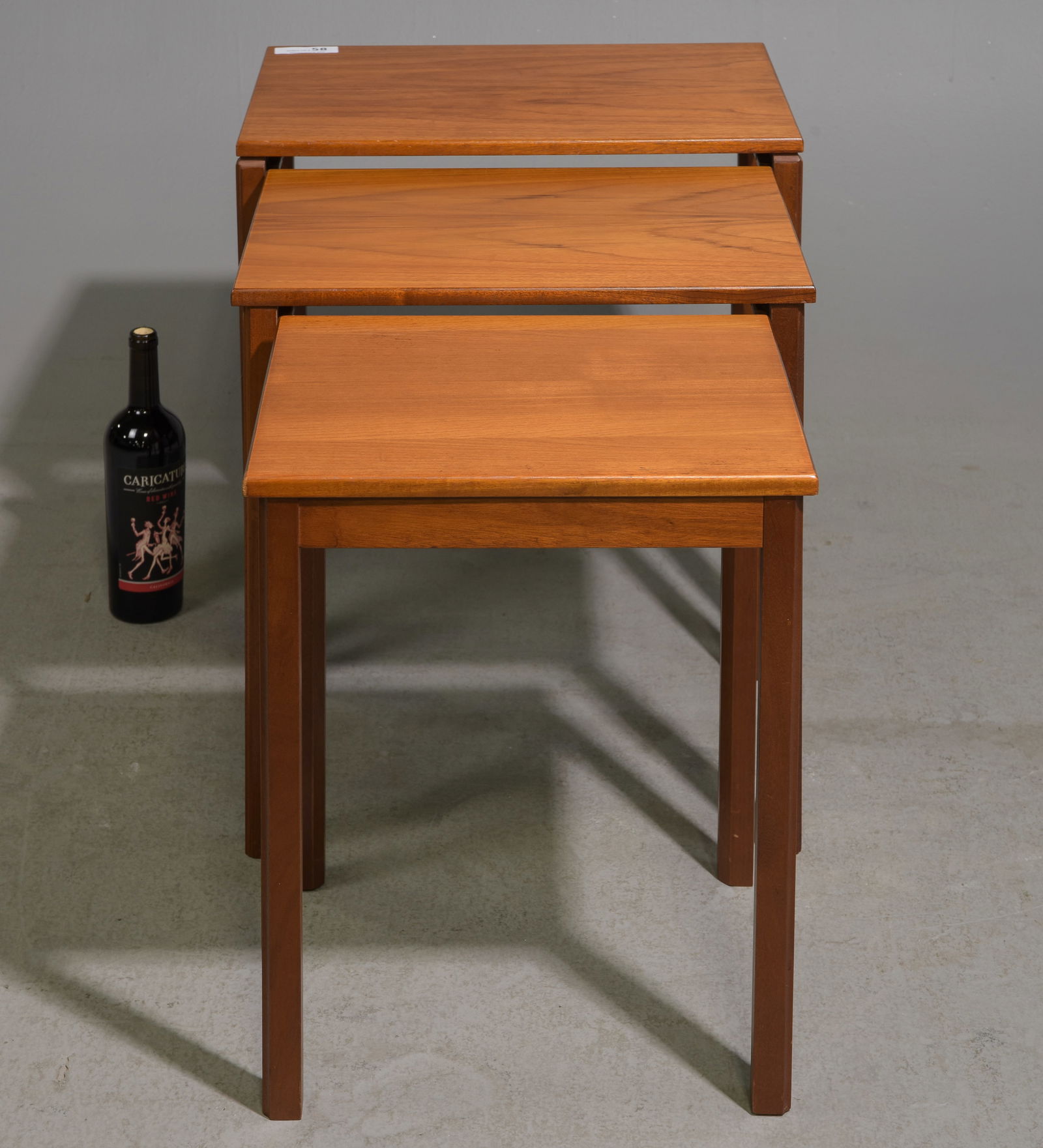 Mid Century Modern Nest of 3 Tables: Danish Modern Style Nest of 3 Tables - Tallest is 20 in tall x 18.5 x 13.5, middle one is 13.5 x 15.5 x 12.5, smallest is 13.5 in tall x 15.5 x 12.5