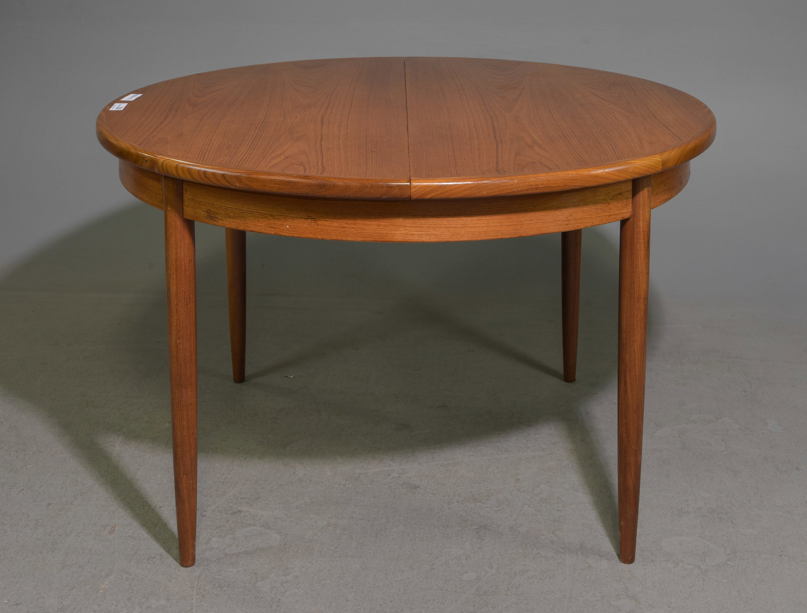 Round Mid Century Table By G-Plan - Pop Up Leaf: This Danish Modern Style Teak Dining Table includes a pop-out butterfly style leaf & is made by Mid Century Modern Furniture Maker G Plan ( GPlan ) - Part of their Fresco Range. - 29 in tall x 48 inch