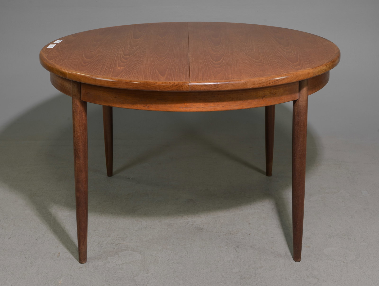 Round Mid Century Table By G-Plan - Pop Up Leaf: This Danish Modern Style Teak Dining Table includes a pop-out butterfly style leaf & is made by Mid Century Modern Furniture Maker G Plan ( GPlan ) - Part of their Fresco Range. - 29 in tall x 48 inch