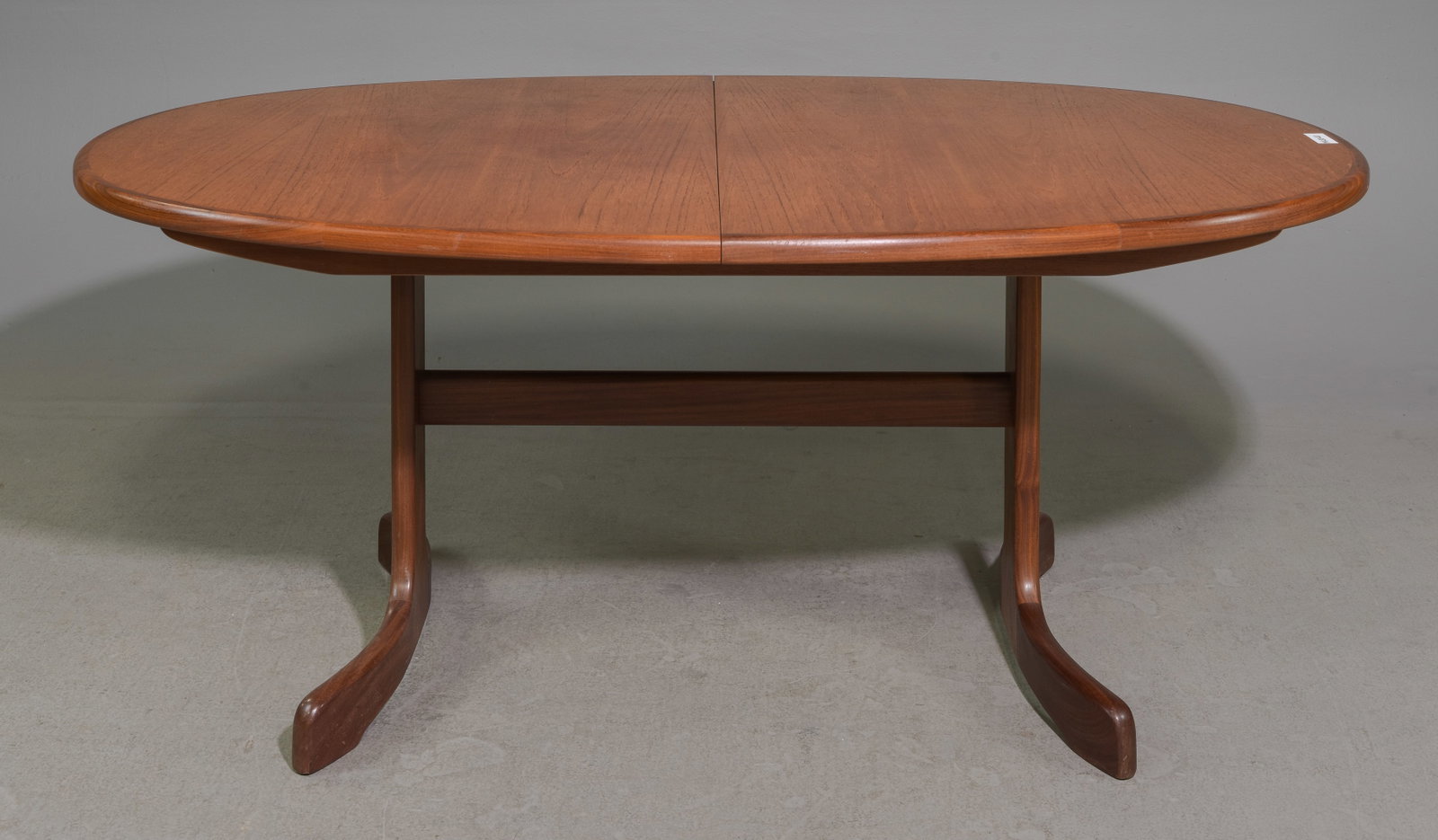 Oval Mid Century Teak Dining Table By G-Plan: This Danish Modern Style Teak Dining Table includes a pop-out butterfly style leaf & is made by Mid Century Modern Furniture Maker G Plan ( GPlan ), part of their fresco range. - 28.25 in tall x 64 x 