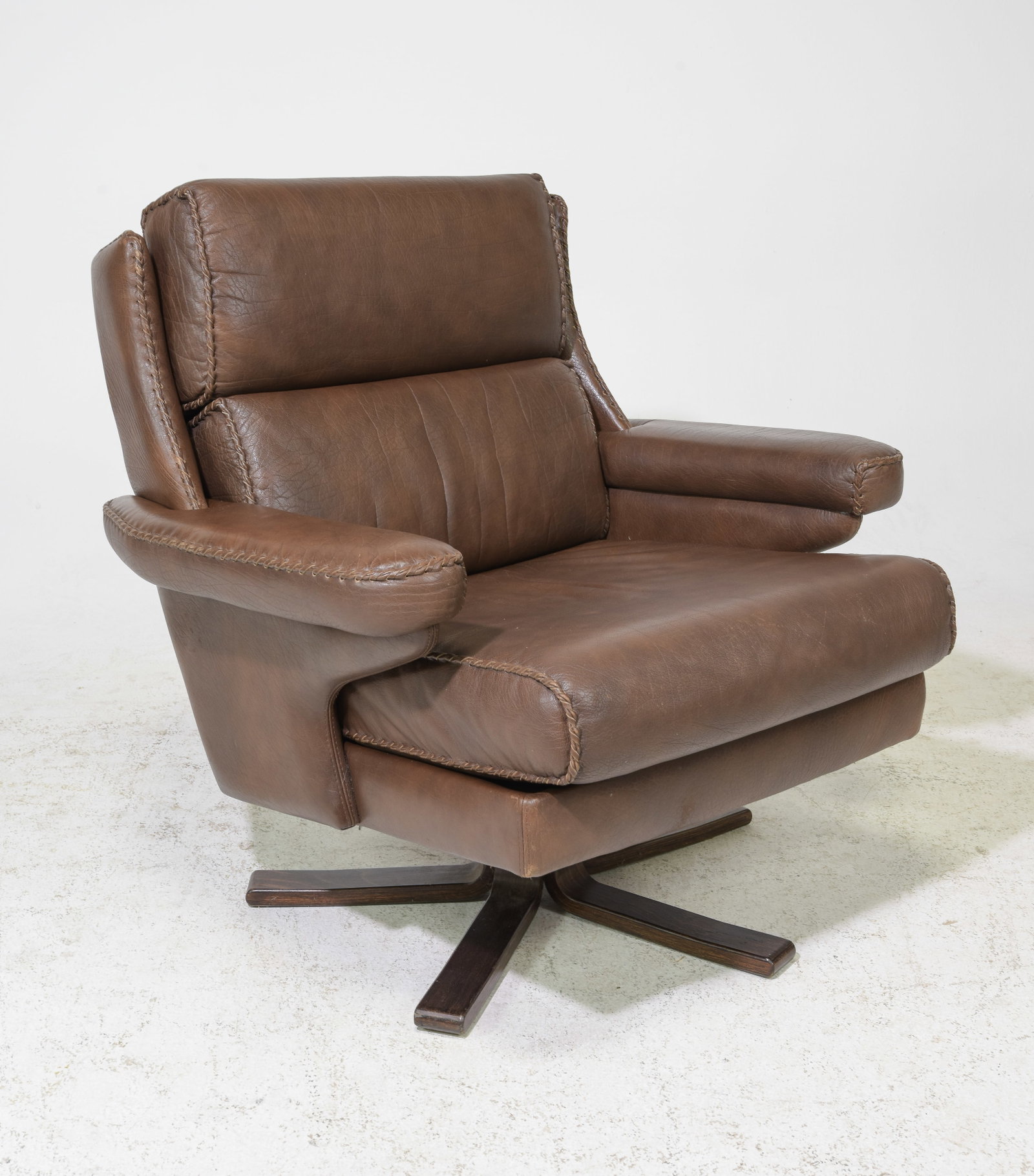 Danish Brown Leather Swivel Lounge Chair: Danish Brown Leather Swivel Lounge Chair - 35 in tall x 35 x 33 with a seat height of 19 inches