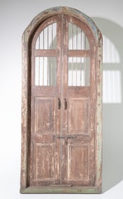 Large Arch Top Wood Door with Iron Bars