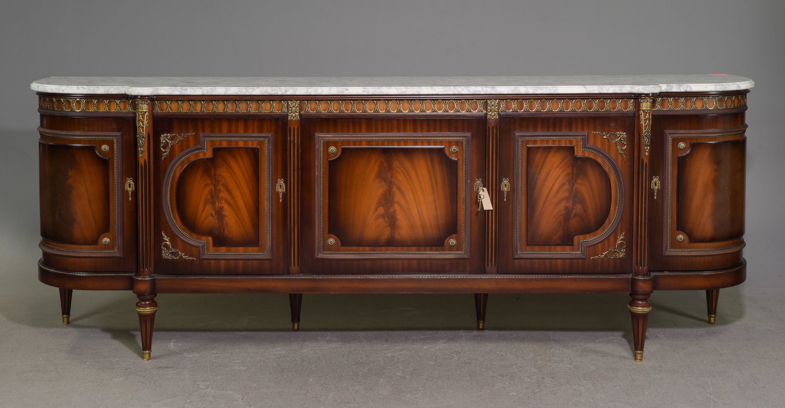 Louis XVI Style Marble Top Mahogany Sideboard: French Louis XVI Style Marble Top Mahogany Curved Sideboard / Enfilade with Gilded Ormolu Adornments - 39 in tall x 105 x 23