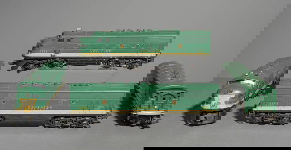 Lionel Southern 2356 Diesel Engines: This lot will fit into a box that is 4 in tall x 14 x 12.5. This lot includes (2) Southern (No. 2356) A's and (2) Southern (No. 2356) B's.
