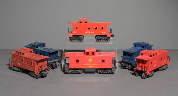 6pcs Lionel Cabooses: 6pcs Lionel Cabooses - This lot consists of a Lionel SP 2257 Model Caboose, a "The Southern Serves The South" Southern X3239 Model Caboose, Two "Boston and Maine" 6017 Model Caboose, an A.T. & S.F. 60