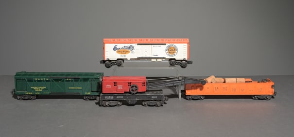 4pcs - Lionel Boxcars, Barrel Car, Etc.