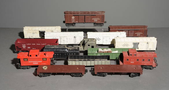 15pcs Lionel Box Cars, Hoppers, Caboose, Etc.: 15pcs Lionel Box Cars, Hoppers, Caboose, Etc. - This lot consists of a Lionel Refrigerator 6472 Box Car, two Automobiles Pennsylvania Railroad 61100 Box Cars, a Baltimore & Ohio B&O 254000 Hopper Car,