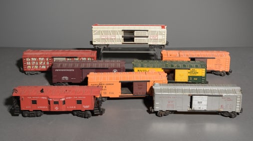 8 Assorted Lionel Box Cars and Caboose
