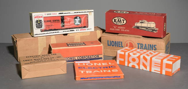 8pcs - Assorted Hand Car, Box Car, Etc.: 8pcs - Assorted Hand Car, Box Car, Etc. in Original Boxes - This lot consists of a Lionel Barrel Loader number 362, Twin Diesel Erie Locomotives Number 2032-20, a 40' Box Car Illinois Central O Gauge