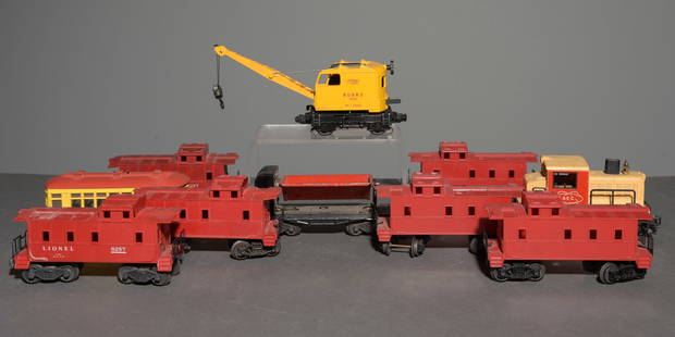 10pcs - Lionel Cabooses, Crane Cars, Etc.: 10pcs - Lionel Cabooses, Crane Cars, Etc. - This slot consists of 6 Lionel Red Cabooses (Only numbers visible on these are two marked 6257), a Lionelville Rapid Transport Passenger Car, a Lionel Lines