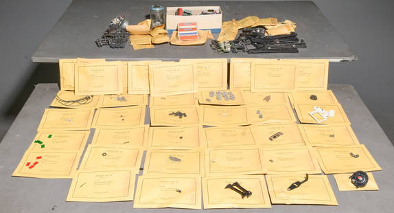 Assorted Train and Track Components #2: This lot contains an assortment of electrical components, wiring, as well as various spare parts related to Lionel trains and tracks to include (4) O-Gauge 2460-12 Crane Booms, vintage bearing trucks,