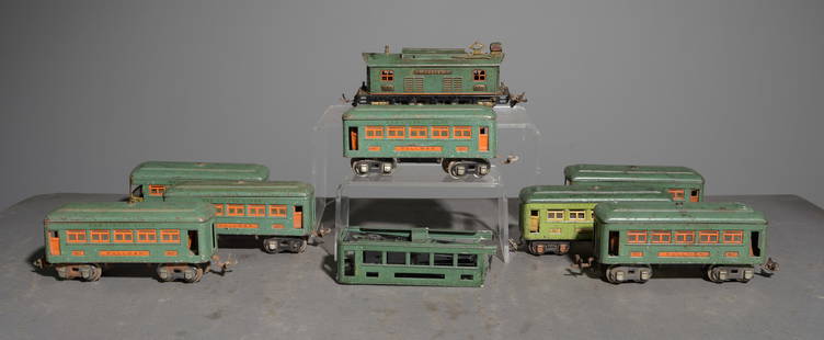 11pcs - Prewar O Gauge Lionel Locomotive + Rail Cars: This lot consists (8) Prewar Lionel O Gauge Rail Cars to include (1) No. 253 Electric Locomotive, (4) No. 607 Pullman Cars (Green and Orange), (1) 607 Pullman Car (Green and Yellow), and (2) No. 608 O