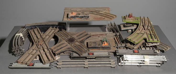 Various Tracks and Switches: (1) Lionel O Guage 'X' Crossing, (1) Lionel No. 20 Crossing, (1) Lionel 222 Electrically Controlled Switch Standard Gauge, (2) Lionel 210 Standard Switch, (3) Lionel O27 Straight Track, (6) Lionel No.