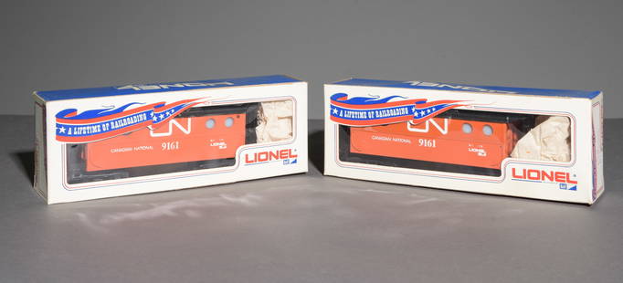 Lionel Canadian National Lighted Caboose: This lot consists of (2) 6-9161 O Gauge Canadian National Lighted Cabooses in original boxes. Each Box measures 3.5in tall x 10 x 2.5.