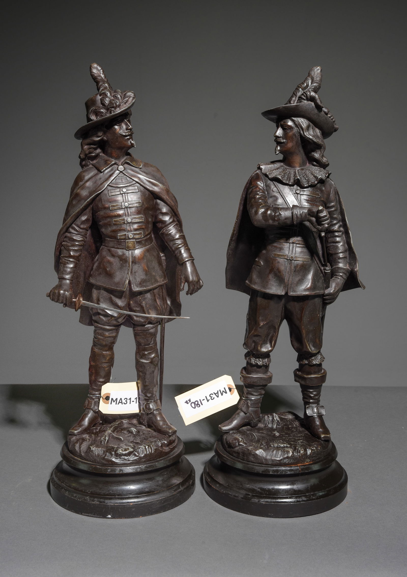Two J. Garnier Cast Metal Musketeer Figures: Two J. Garnier Cast Metal Musketeer Figures on Wood Bases - 21 in tall x 9 x 8 each