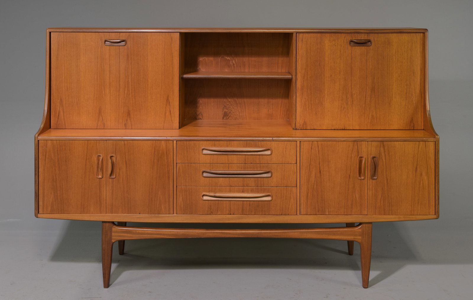 Mid Century Teak Fresco Cocktail Cabinet - Gplan: This Danish Modern Style hutch / high board is British and made by Mid Century Modern Furniture Maker G Plan ( Gplan ) & is part of their "Fresco" Range. It has a drop down section and open stretcher 