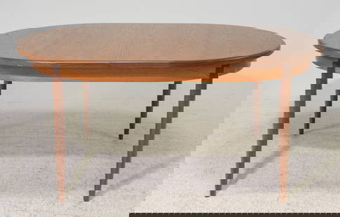 Mid Century Oval Dining Table by G-Plan: This Danish Modern Style Oval dining table with four leg base is made by Mid Century Modern Furniture Maker G Plan ( Gplan ), it has a pop out leaf . - 29 in tall x 64 x 44, Leaf adds an additional 18