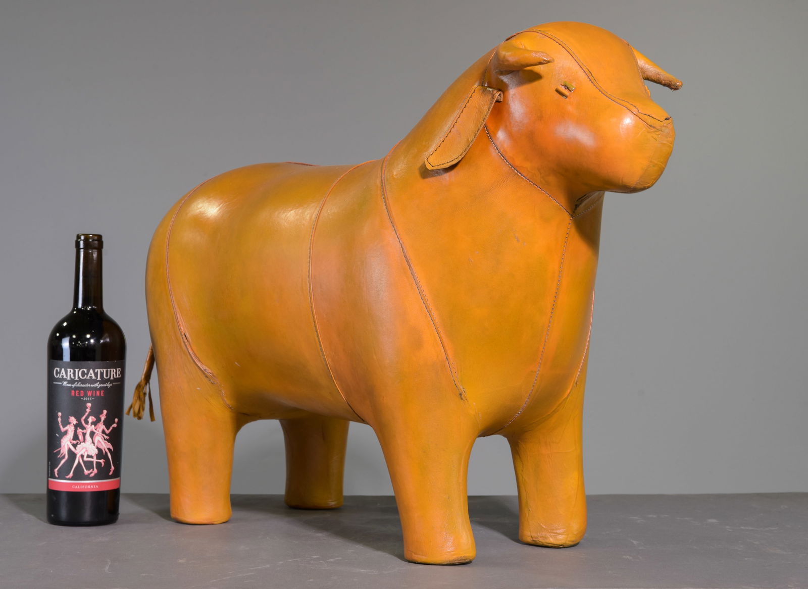 Leather Bull Stool In The Manner Of Omersa: This Bull footstool is new and made of leather in the style of those sold at Liberty & Co in London - 19 in tall x 29 x 9