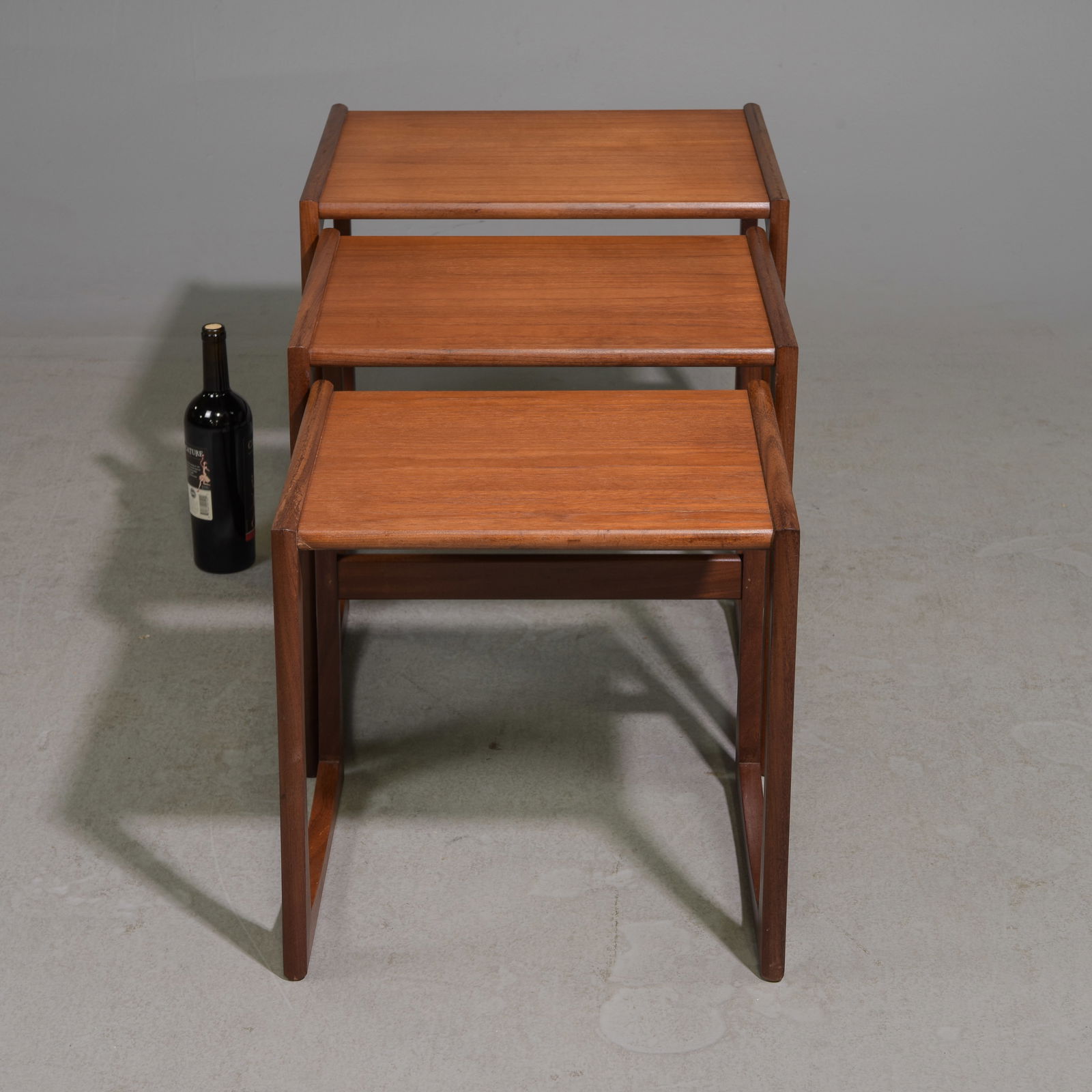 Mid Century Modern Quadrille Nest of 3 Tables: This Danish Modern Style Nest is British and made by Mid Century Modern Furniture Maker G Plan ( Gplan ) it stacks to make a bookcase as well. - 19.5 in tall x 21 x 17, 18 in tall x 19 x 15 and 17 in