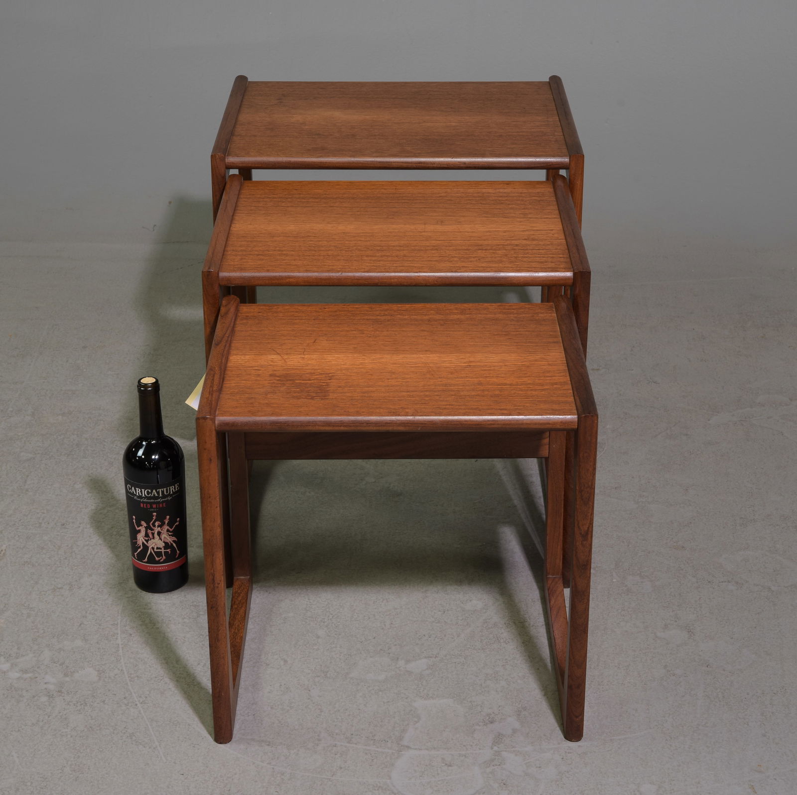 Mid Century Modern Quadrille Nest of 3 Tables: This Danish Modern Style Nest is British and made by Mid Century Modern Furniture Maker G Plan ( Gplan ) it stacks to make a bookcase as well. - 19.5 in tall x 21 x 17, 18 in tall x 19 x 15, 17 in tal