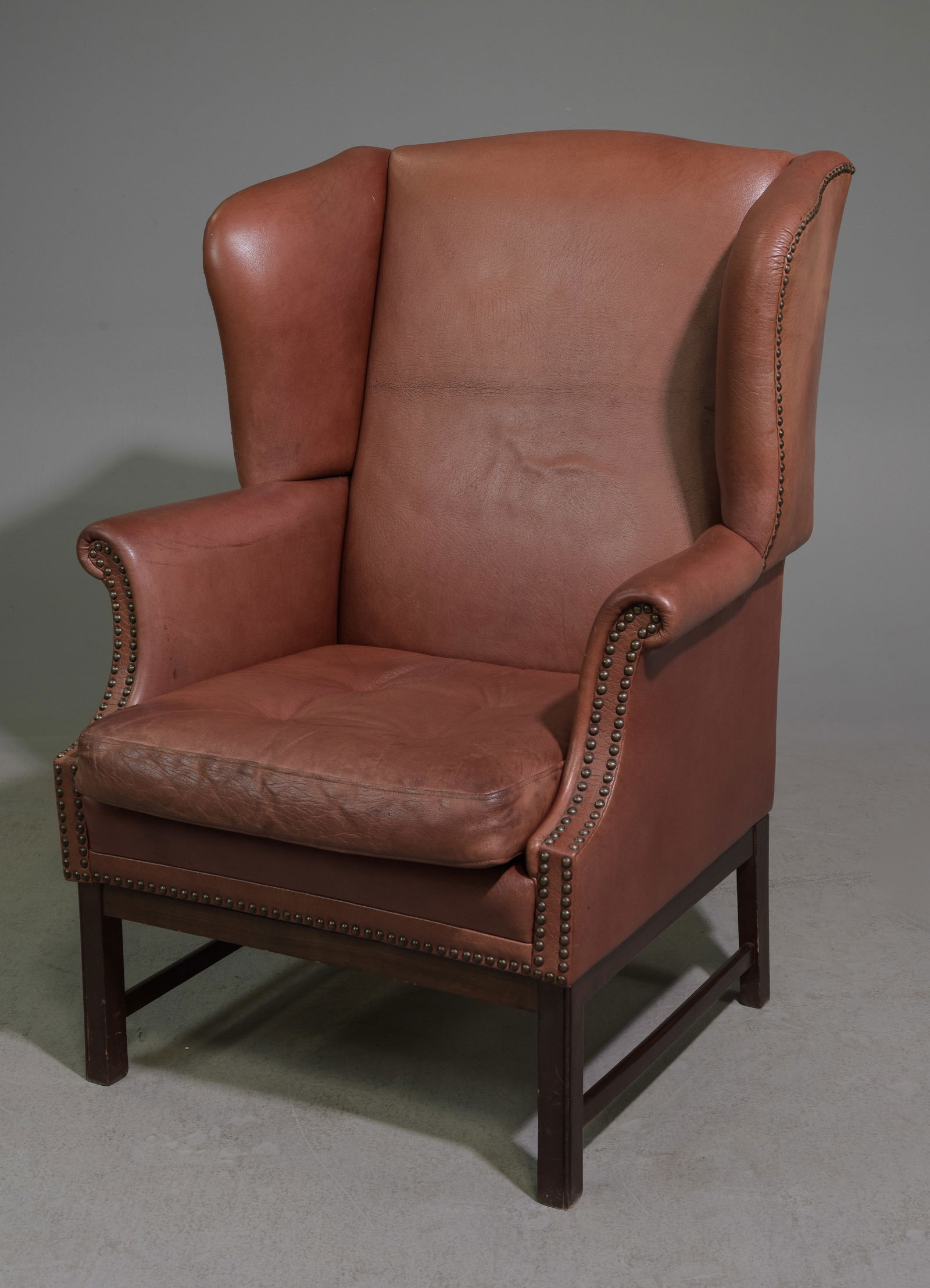 Danish Brown Leather Wing Bak Arm Chair: Danish Brown Leather Wing Bak Arm Chair - 43 in tall x 33 x 29 with a seat height of 18 inches