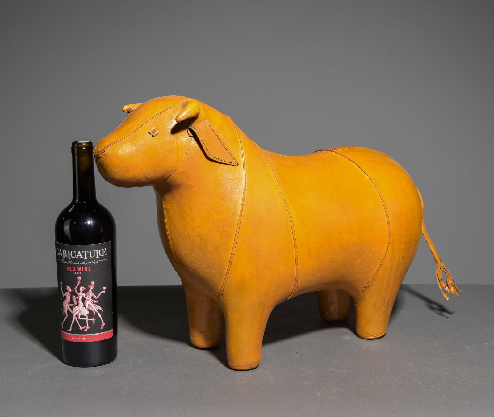 Leather Bull Stool In The Manner Of Omersa: This Bull footstool is new and made of leather in the style of those sold at Liberty & Co in London - 14 in tall x 20 x 8