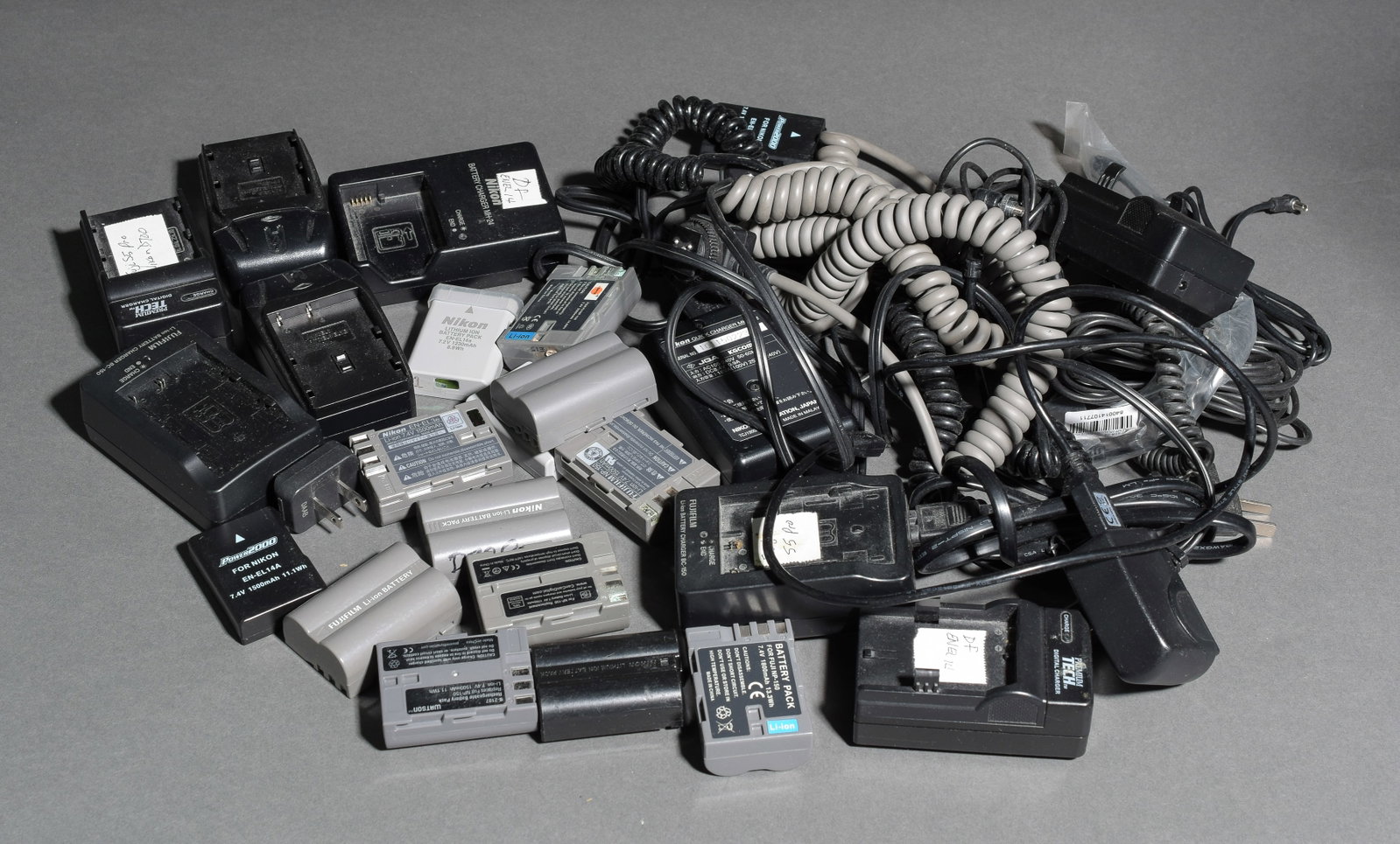 Many Battery Rechargers, NiCAD batteries, & Cords: Item: Many Battery Rechargers, NiCAD batteries, & Cords Brand: Nikon Model/Serial Number: