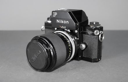 Nikon F film camera with lens  (NIKKOR C AUTOR 586617?)