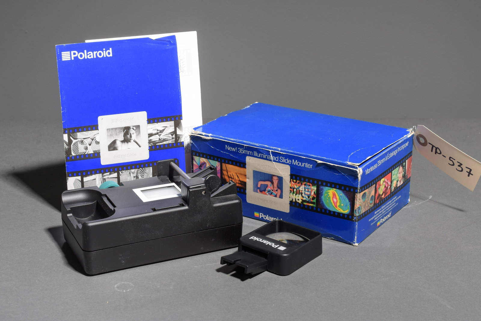 35mm Illuminated Slide Mounter Polaroid camera in original packaging (has been opened): Item: 35mm Illuminated Slide Mounter Polaroid camera in original packaging (has been opened) Brand: Polaroid Model/Serial Number: