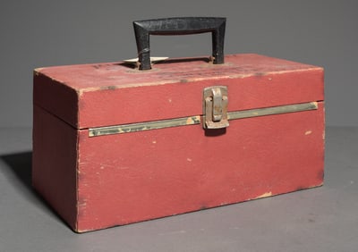 Red Tool box of assorted camera parts, components