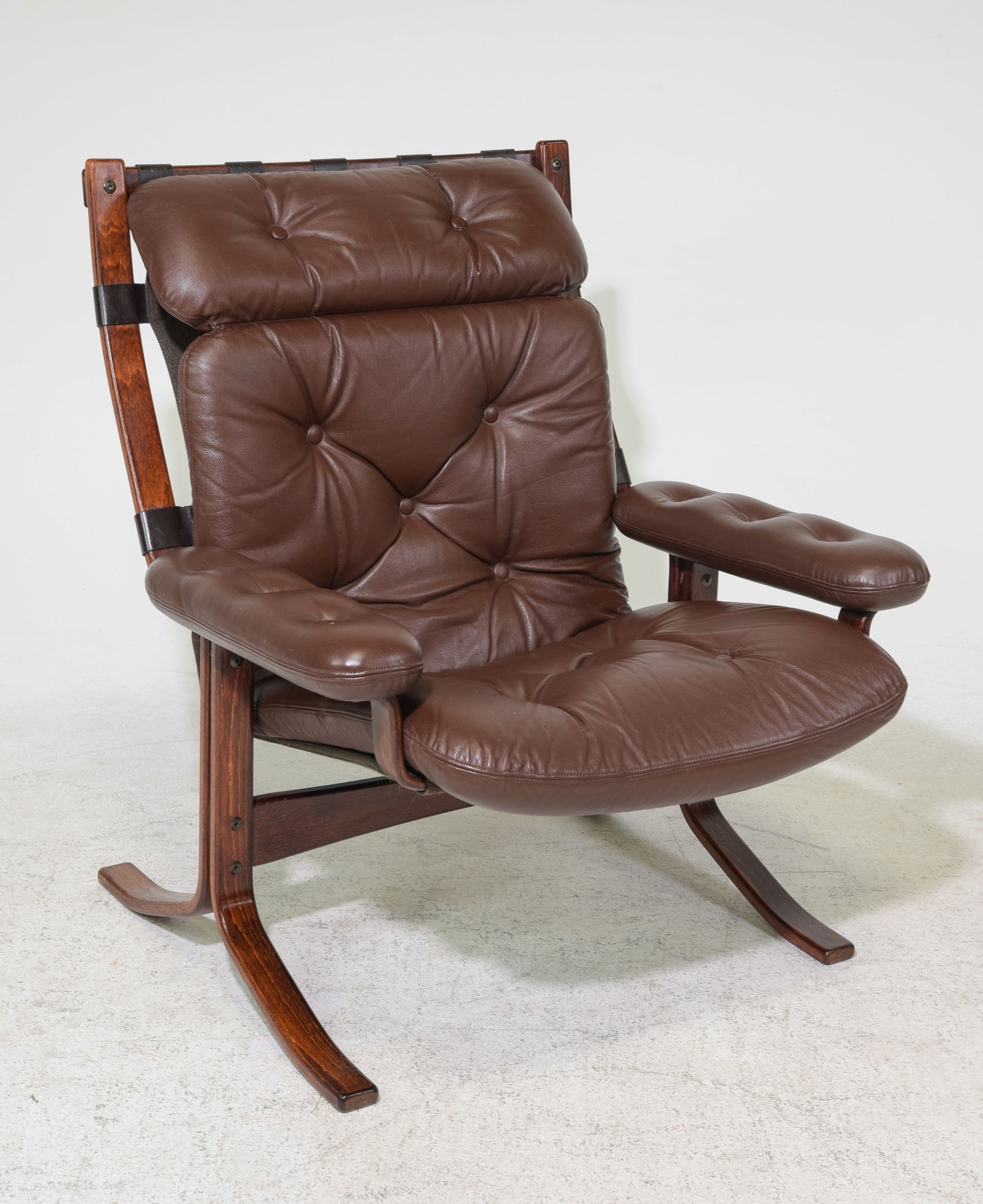 Danish Modern Brown Leather Arm Chair: Danish Mid Century Modern Brown Leather Arm Chair - 37 in tall x 31.25 x 32 with a seat height of 16 inches