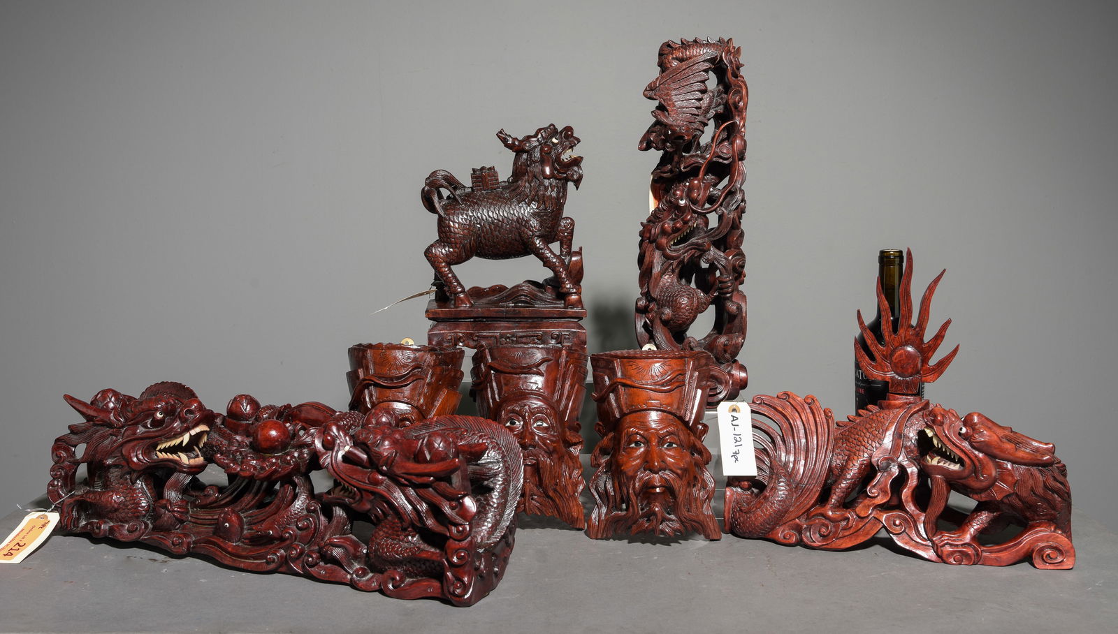 7pcs Asian Hand Carved Rosewood Dragon Statues: 7pcs Chinese Hand Carved Rosewood Dragon Statues - Tallest is 16.5 in tall x 6 x 5, longest is 6 in tall x 21 x 7 - Dragons and these type of sculptures often represent power, good luck and wealth.