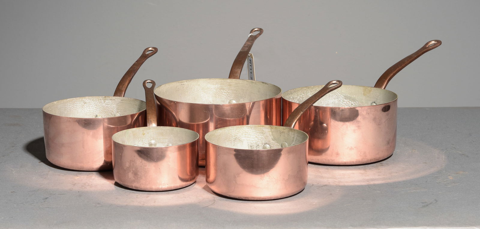 French Polished Copper Set of 5 Sauce Pans #1: French Polished Copper Set of 5 Sauce Pans - Largest is 6.5 in tall x 16.5 x 8 - Reminder, the measurements are for shipping purposes. - These are marked