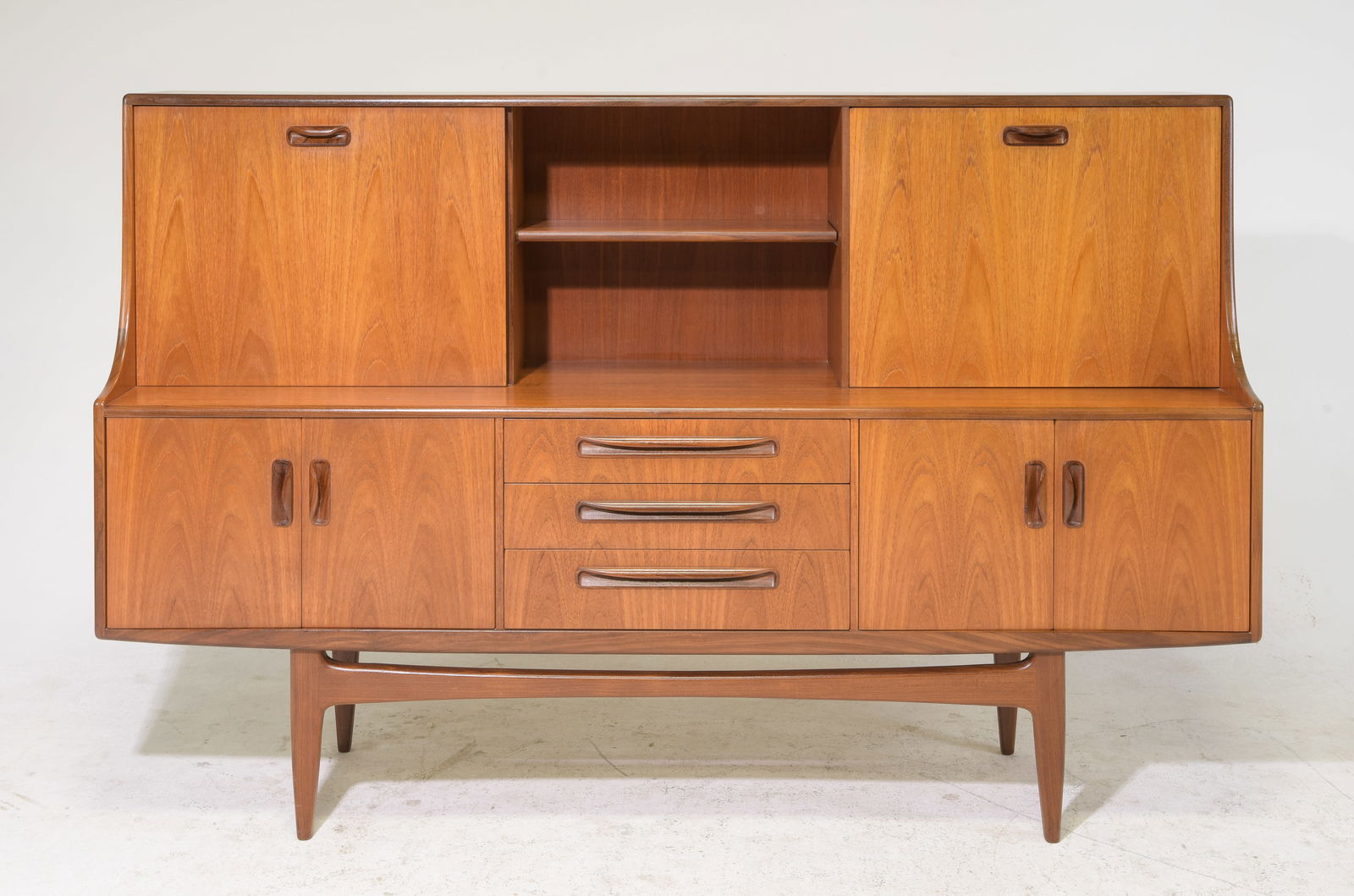 Mid Century Teak Fresco Cocktail Cabinet - Gplan: This Danish Modern Style hutch / high board is British and made by Mid Century Modern Furniture Maker G Plan ( Gplan ) & is part of their "Fresco" Range. It has a drop down section and open stretcher