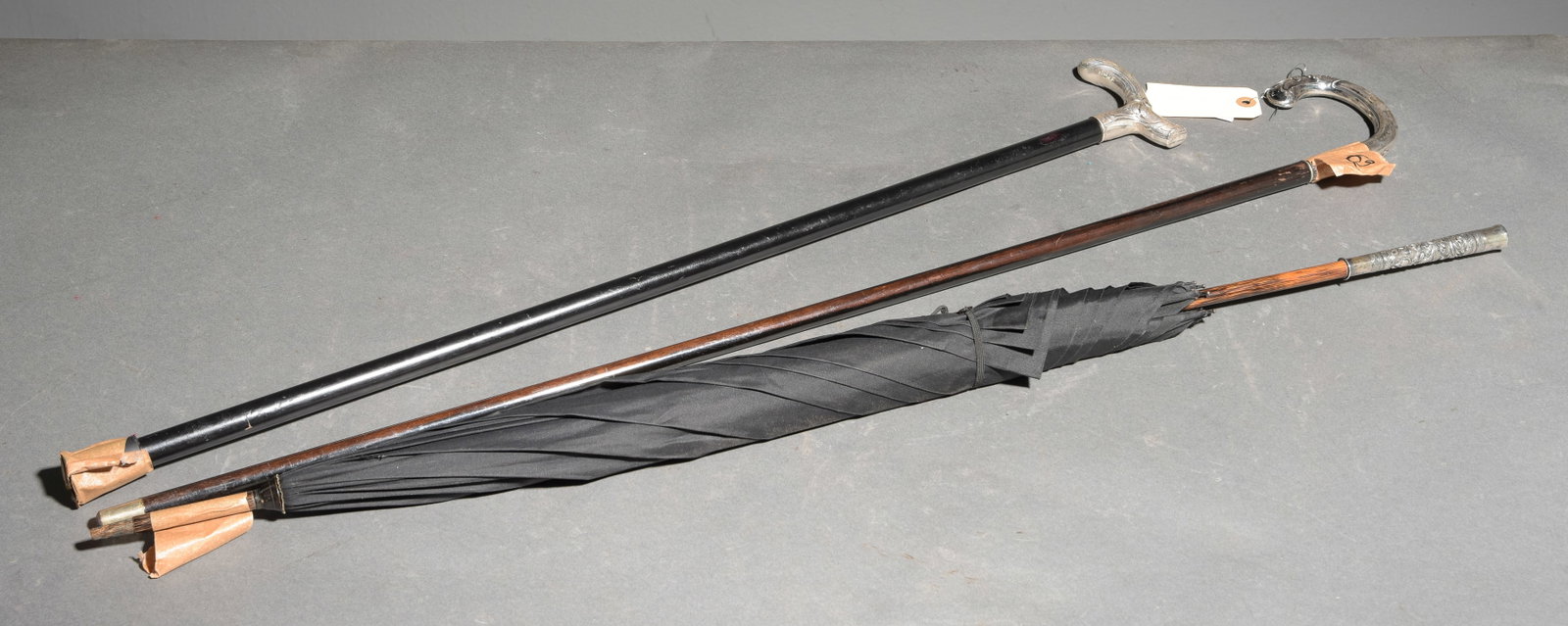 2 Canes & 1 Umbrella With Silver Handles: 2 Canes & 1 Umbrella With Silver Handles - 36 in tall x 4 x 1