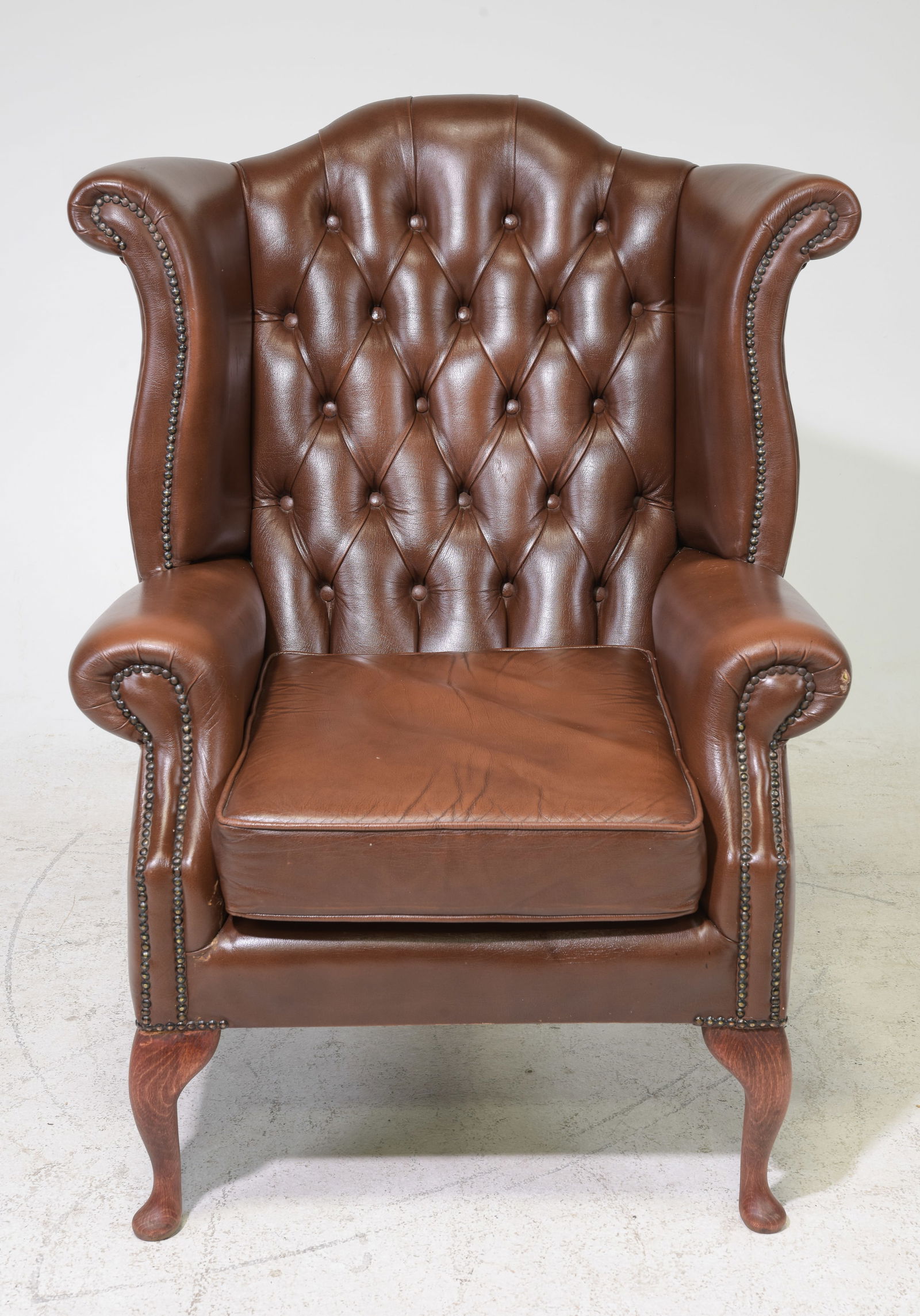 British Chesterfield Wing Back Arm Chair: British Chesterfield Leather Wing Back Arm Chair - 44 in tall x 35 x 29, seat height is 19