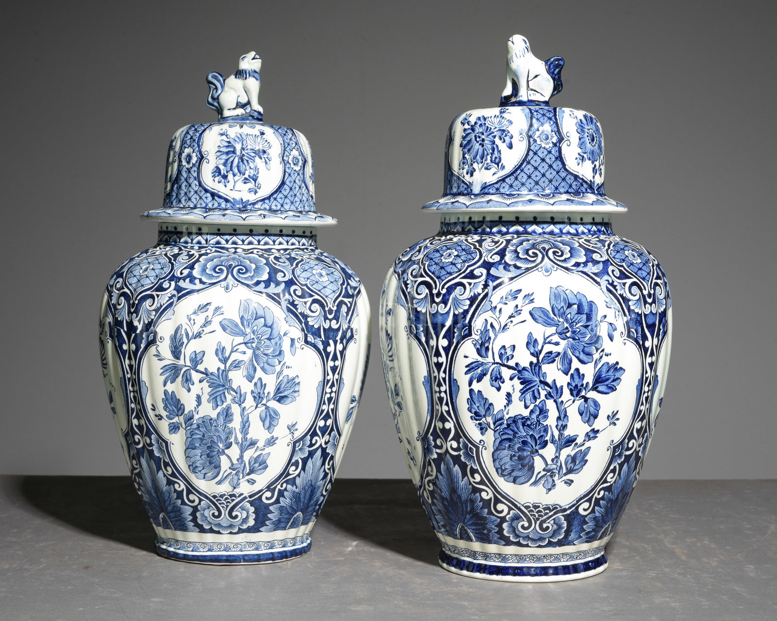 2 Blue & White Delft Urns / Vases with Lids: 2 Blue & White Delft Urns / Vases with Lids marked Made in Holland - One is stamped Boch - 18 in tall x 10 inch diameter