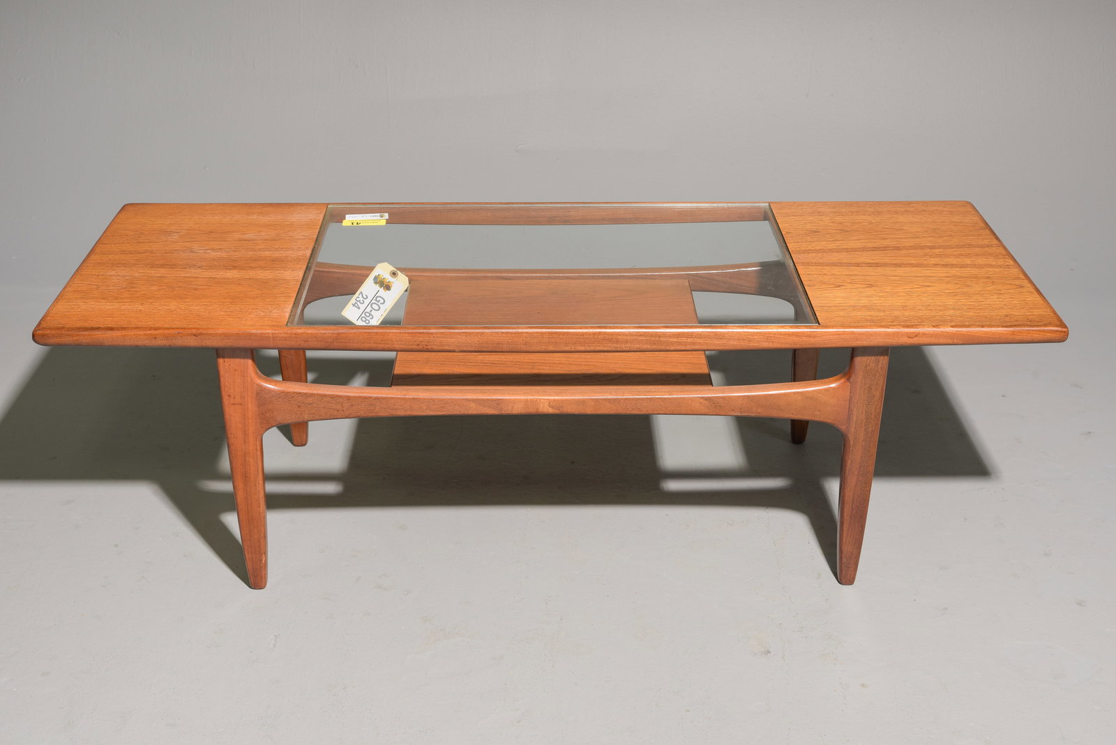 G-Plan Fresco Coffee Table as seen in Mad Men: This Danish Modern Style teak coffee table is British and made by British Mid Century Modern Furniture Maker G Plan (GPlan). This model table was featured in the Mid Century Modern office of Don Drape
