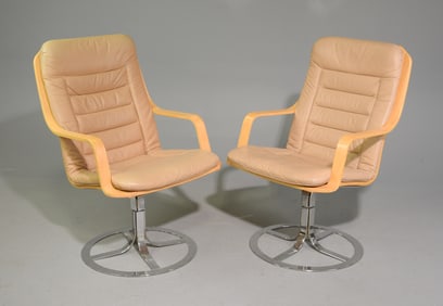 Pair Of Scandinavian Swivel Lounge Arm Chairs