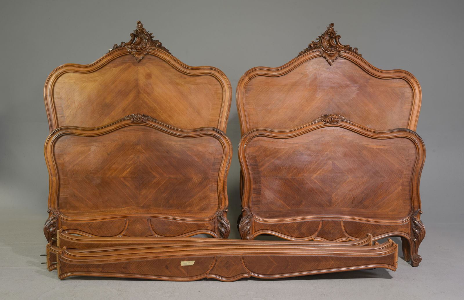 2 Louis XV Style Walnut Beds with Rails: 2 French Louis XV Style Walnut Beds with Rails - Headboards are 58.5 in tall x 44 x 3.5 each, Rails are 75 inches long each - This bed is a European size which can usually be converted to an American