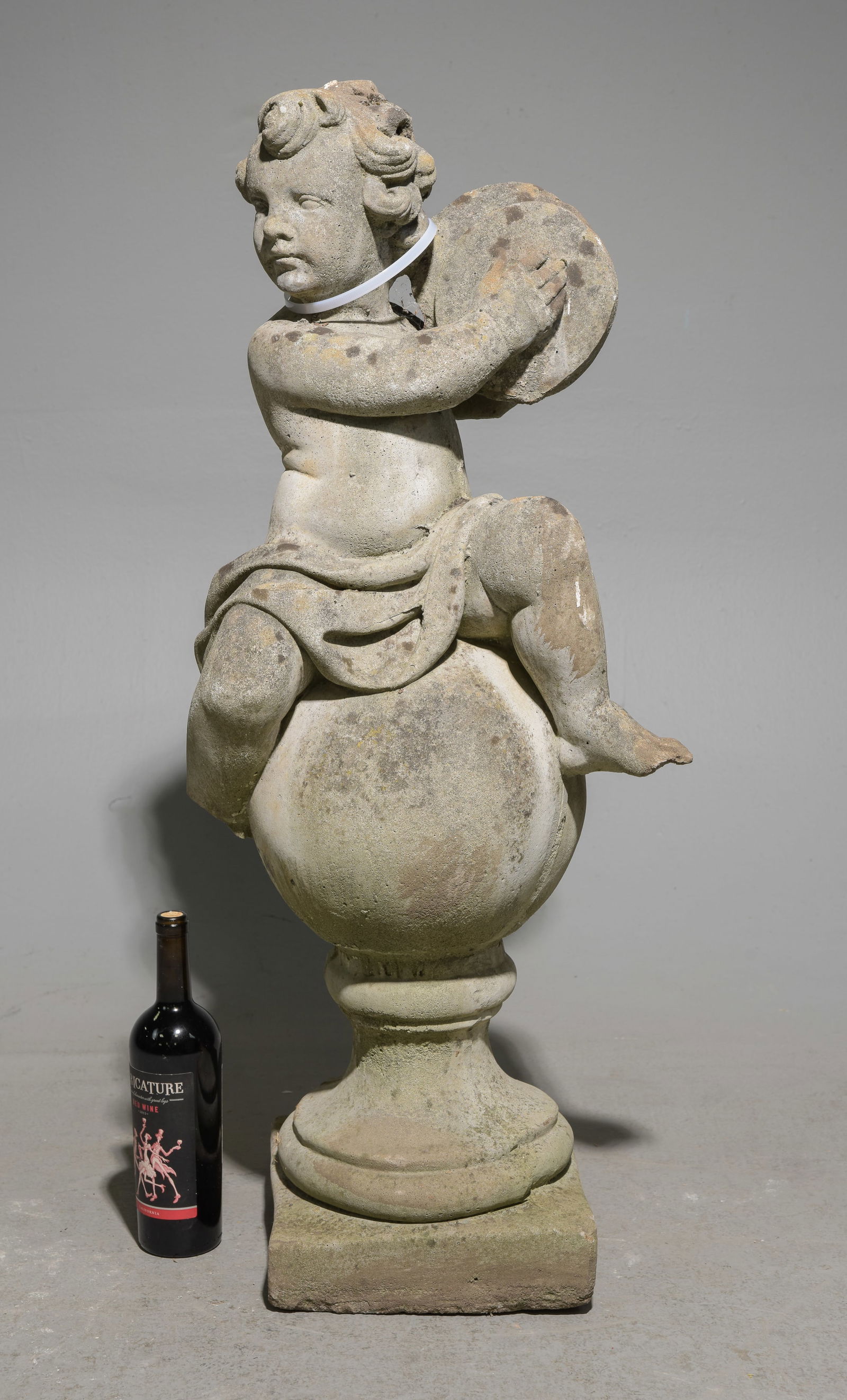 Cast Stone / Concrete Child Putti with Instrument: Cast Stone / Concrete Child Putti Playing a Musical Instrument - 40 in tall x 16 x 10