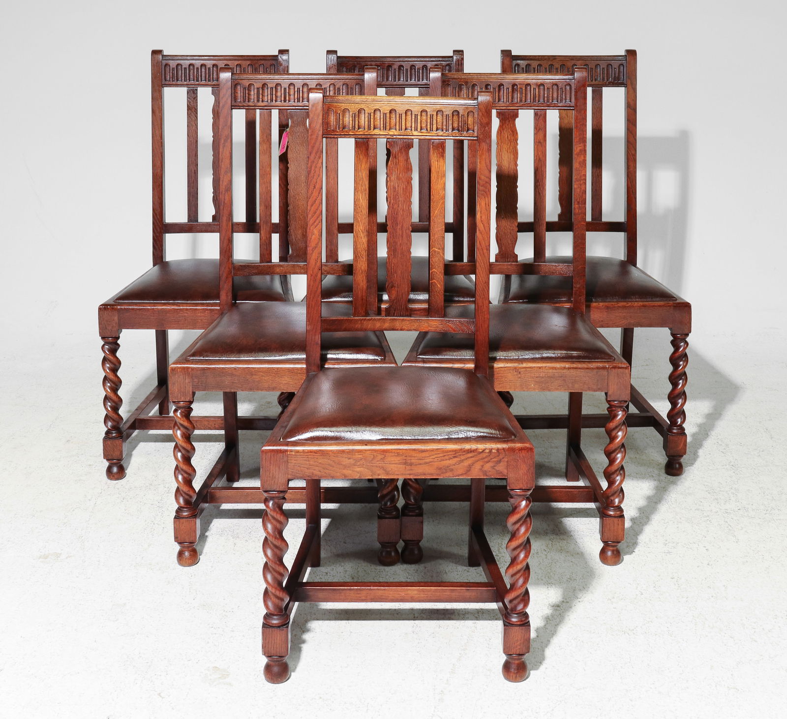 British Oak Barley Twist Set of 6 Dining Chairs: British Oak Barley Twist Set of 6 Dining Chairs with Brown Vinyl Seats - 40 in tall x 19 x 18 each with a seat height of 18 inches - The seats do not pop out