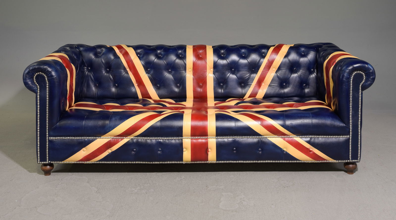 Union Jack Leather Button Tufted Sofa: Union Jack Leather Chesterfield British / English Style Sofa - 28 in tall x 84 x 33.5, Seat height is 16 inches, Seat depth is 23 inches and the width is 67 inches - This has been painted in the Union