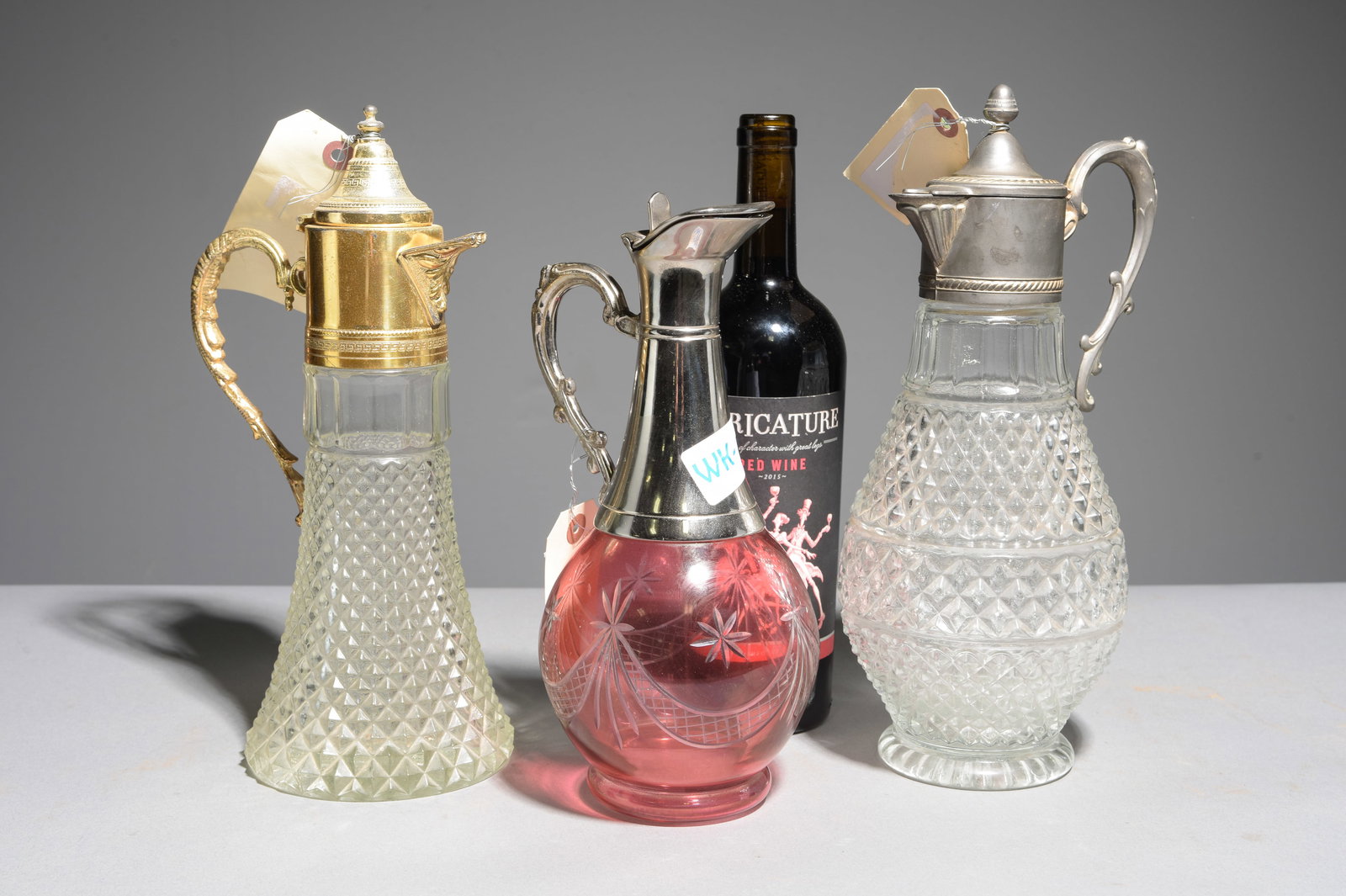 Three Assorted Glass Claret Jugs (1 of 4)