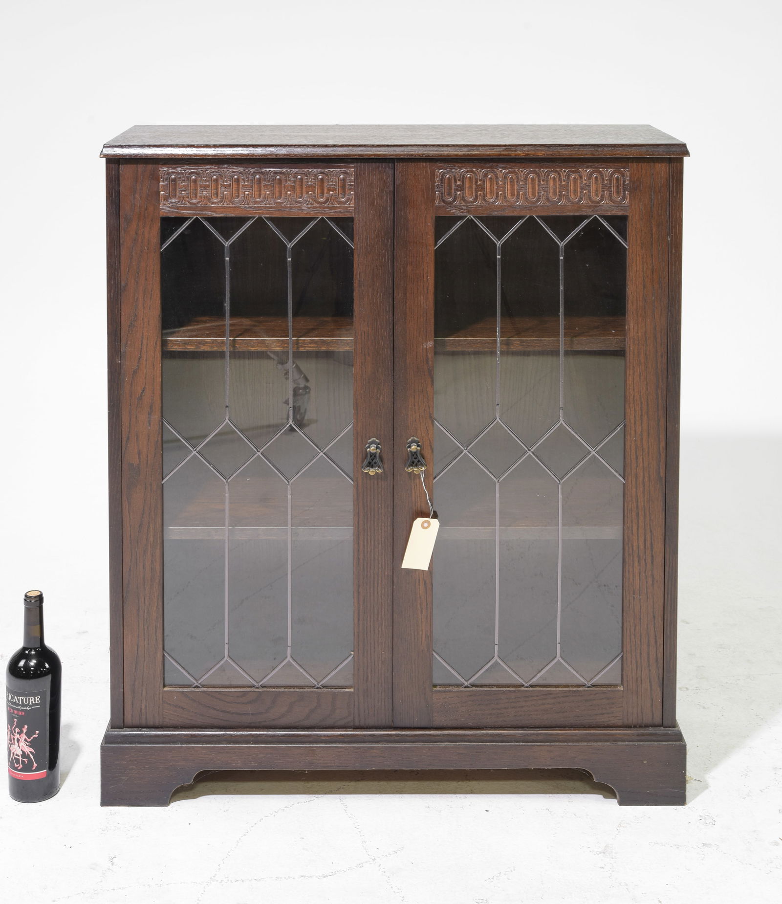 British Leaded Glass Oak Two Door Bookcase: British Leaded Glass Oak Two Door Bookcase - 38 in tall x 33 x 11.5