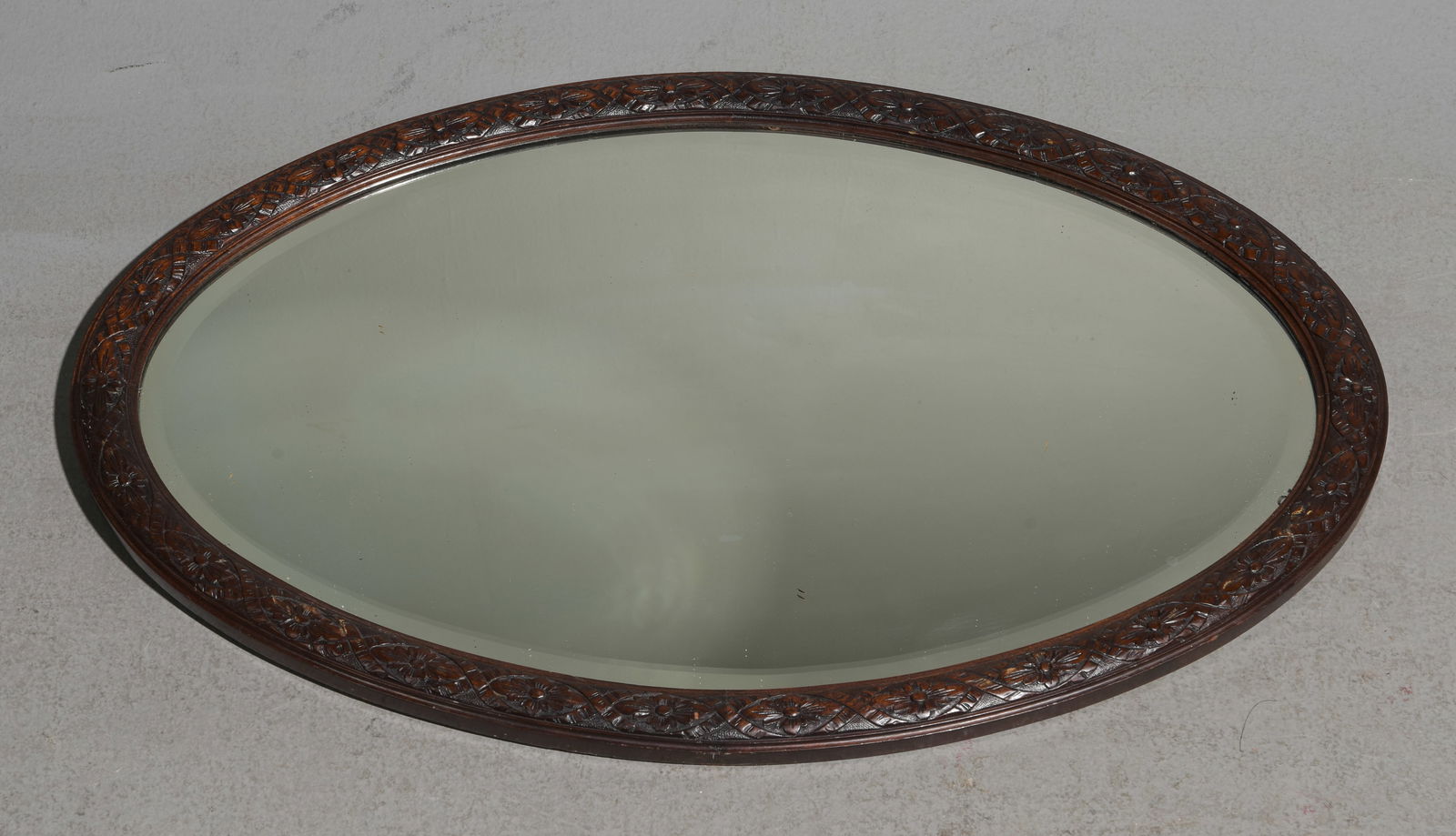 English Carved Oak Framed Oval Mirror: English Carved Oak Framed Oval Mirror - 21 in tall x 33 x 1