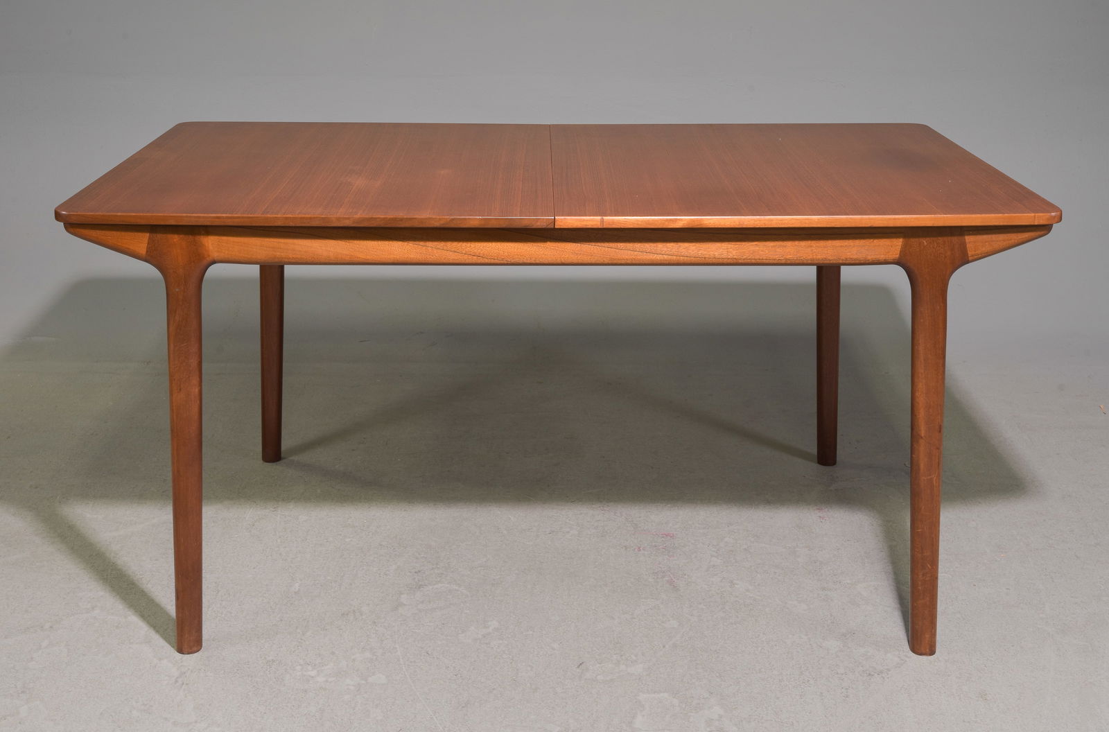Mid Century Modern Double Leaf Table - McIntosh: Danish Modern Style Teak Double Pop Up Leaf Dining Table by McIntosh - 29 in tall x 62.5 x 36, Leaves add an additional 15 inches each, Floor to apron is 25.5 inches, Space between the legs is 44.5 in