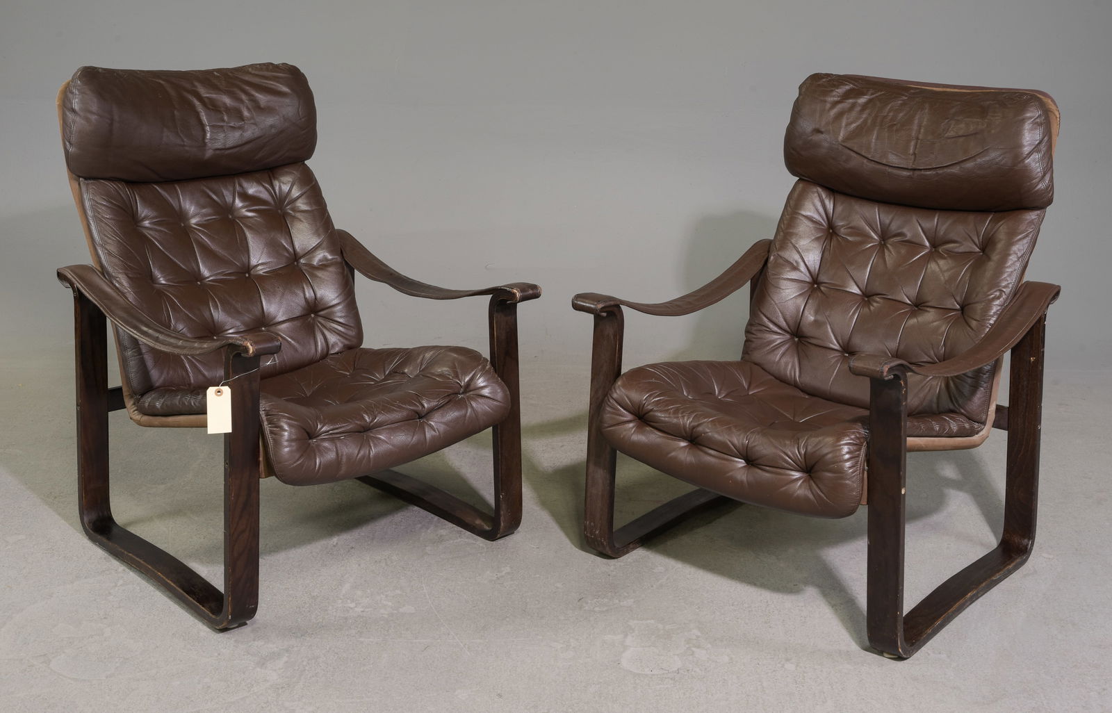 Pair Of Bjarne Dahlqvist Brown Leather Arm Chairs: Pair Of Bjarne Dahlqvist Brown Leather Arm Chairs - 36 in tall x 32 x 17, seat height is 15 in